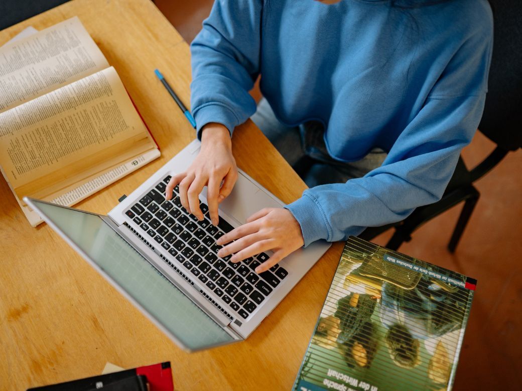A student writing a supplemental essay